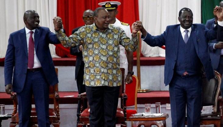 William Ruto (left) and Raila Odinga (right) are facing off to see who succeeds President Uhuru Muigai Kenyatta (centre)